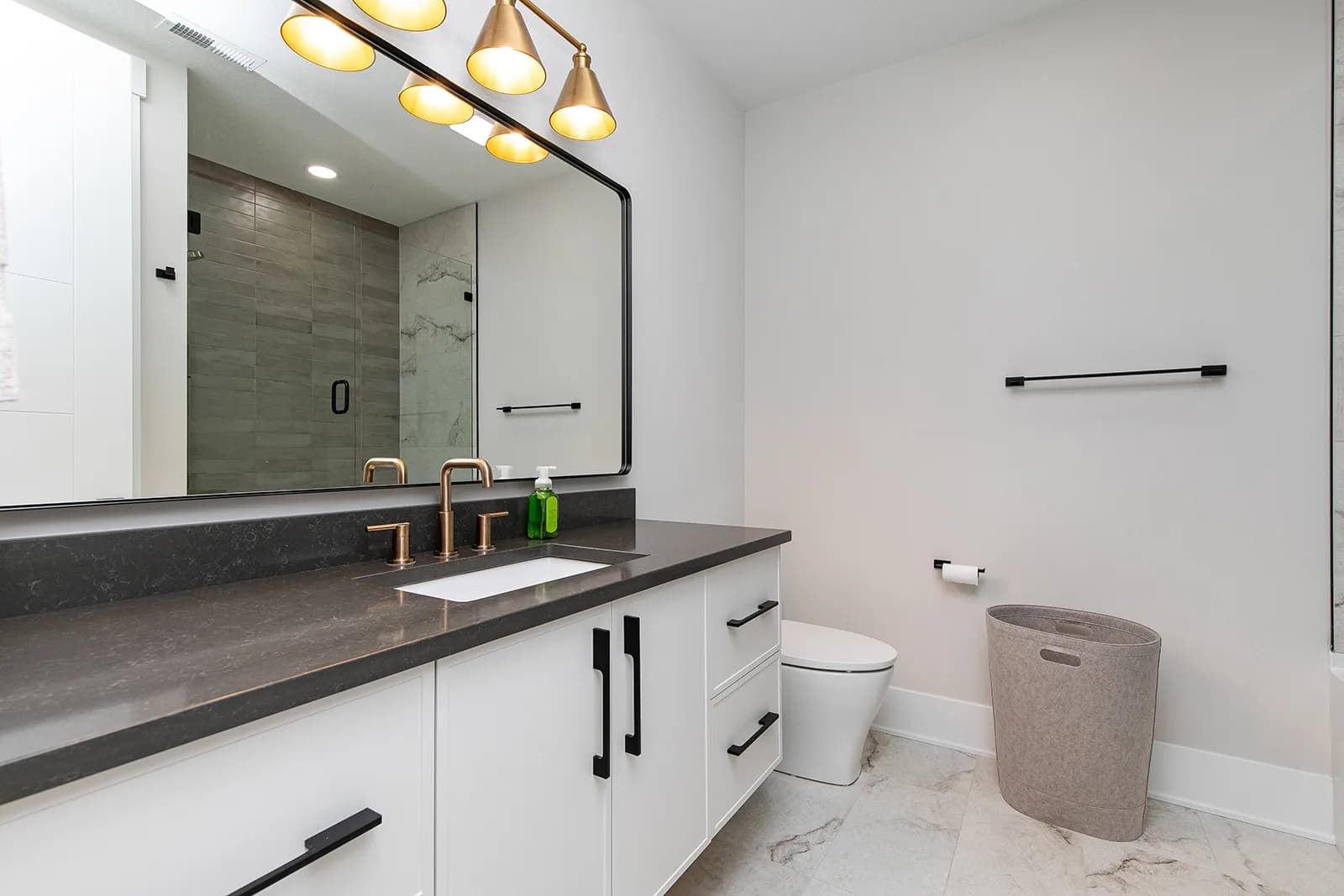3856 NW 177th Ct — bathroom with gold fixtures