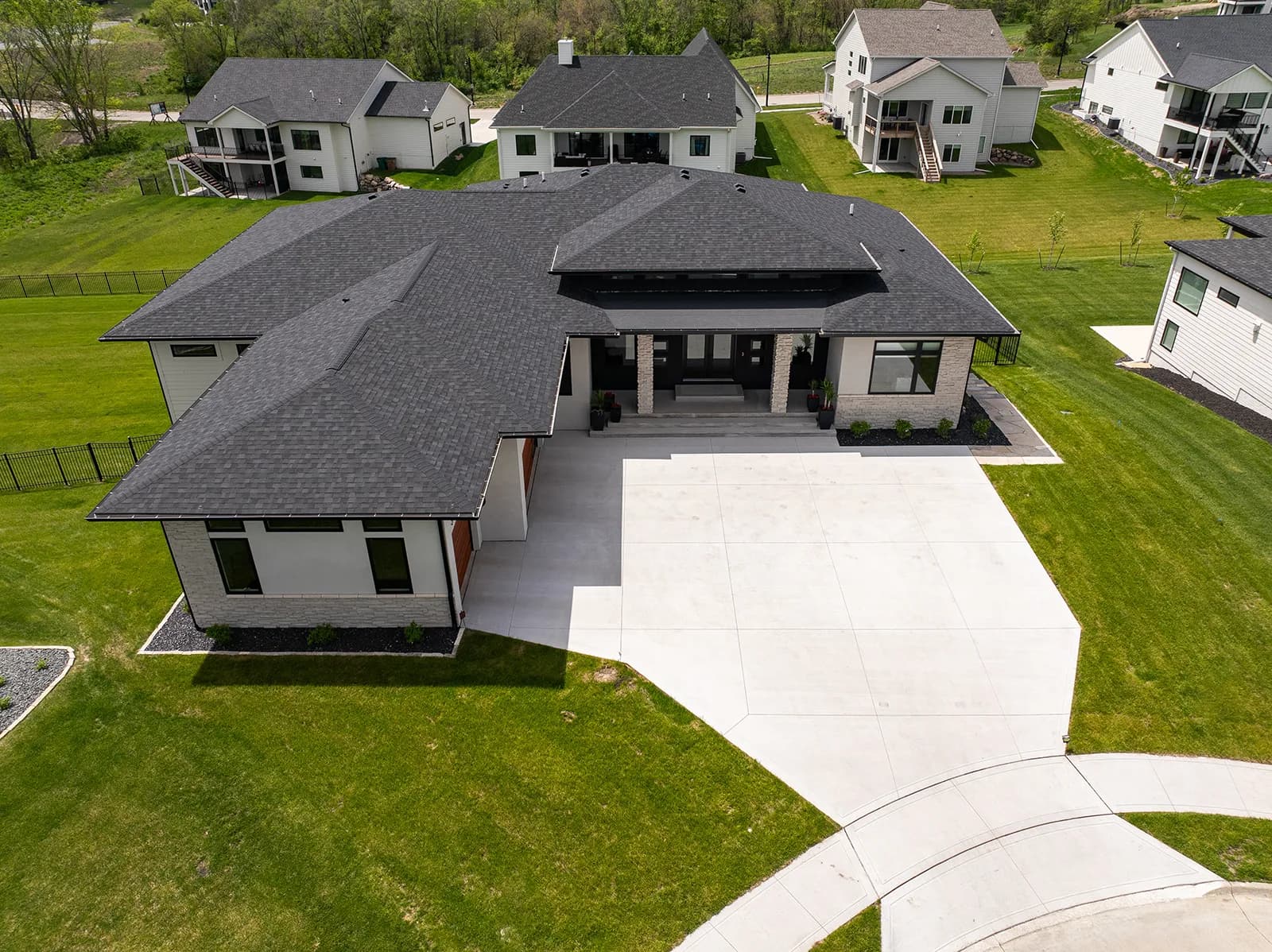 3856 NW 177th Ct — aerial of home and drive
