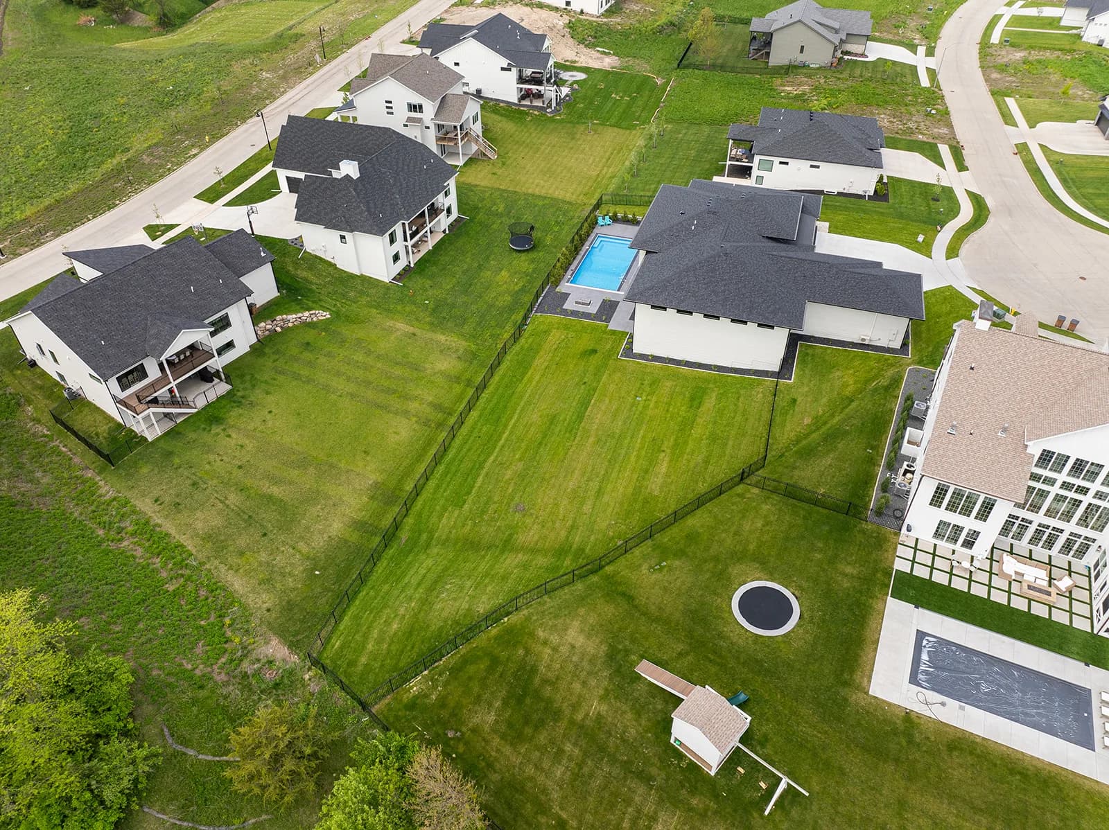 3856 NW 177th Ct — aerial view with neighboring homesites