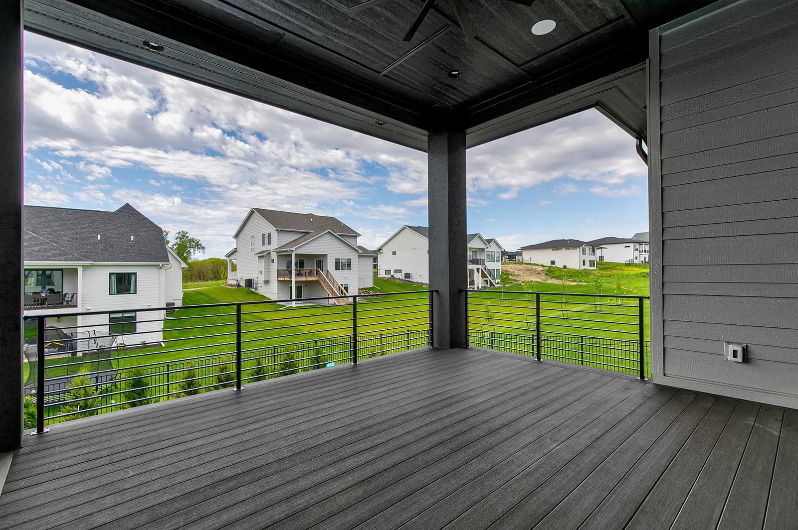 3856 NW 177th Ct — covered deck overlooking the backyard
