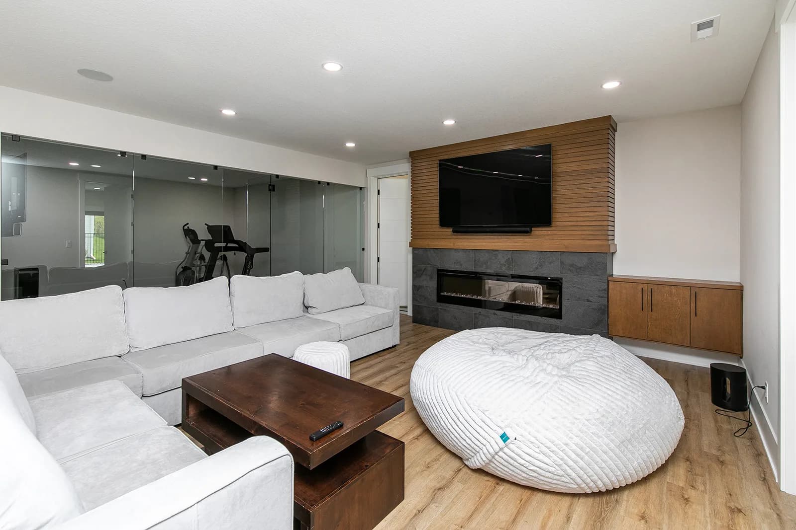 3856 NW 177th Ct — basement lounge with home gym