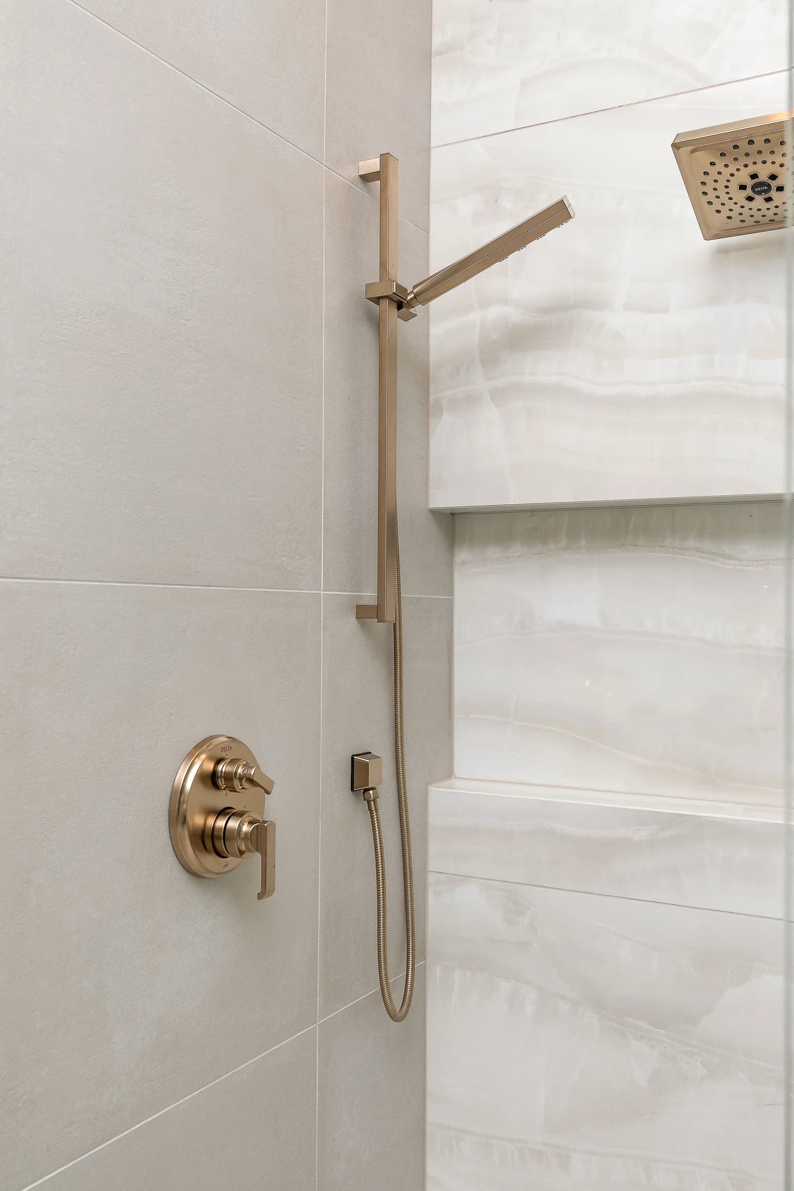 Forest Pointe — brushed-gold shower fixtures