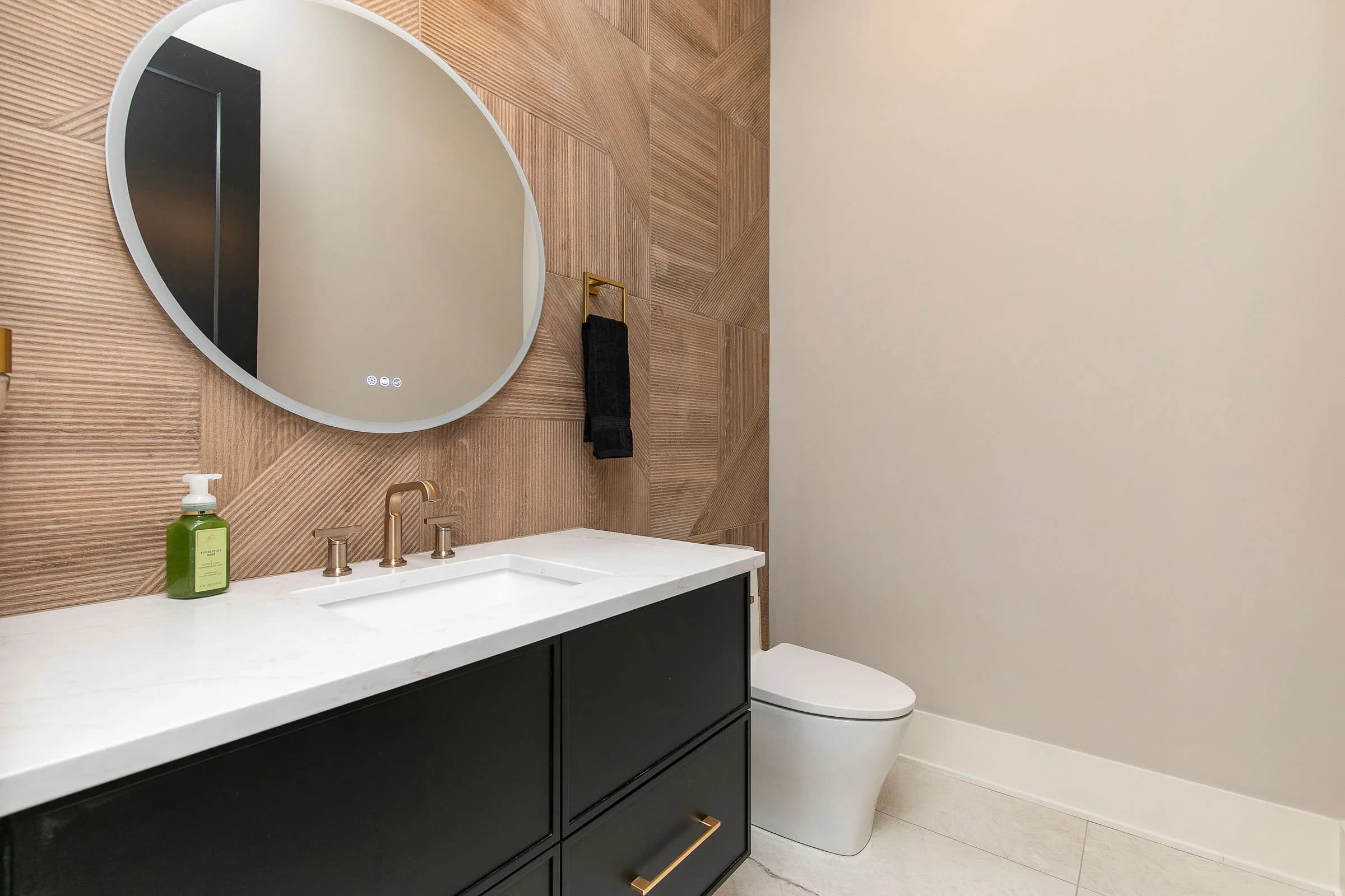 Forest Pointe — powder bath with round mirror