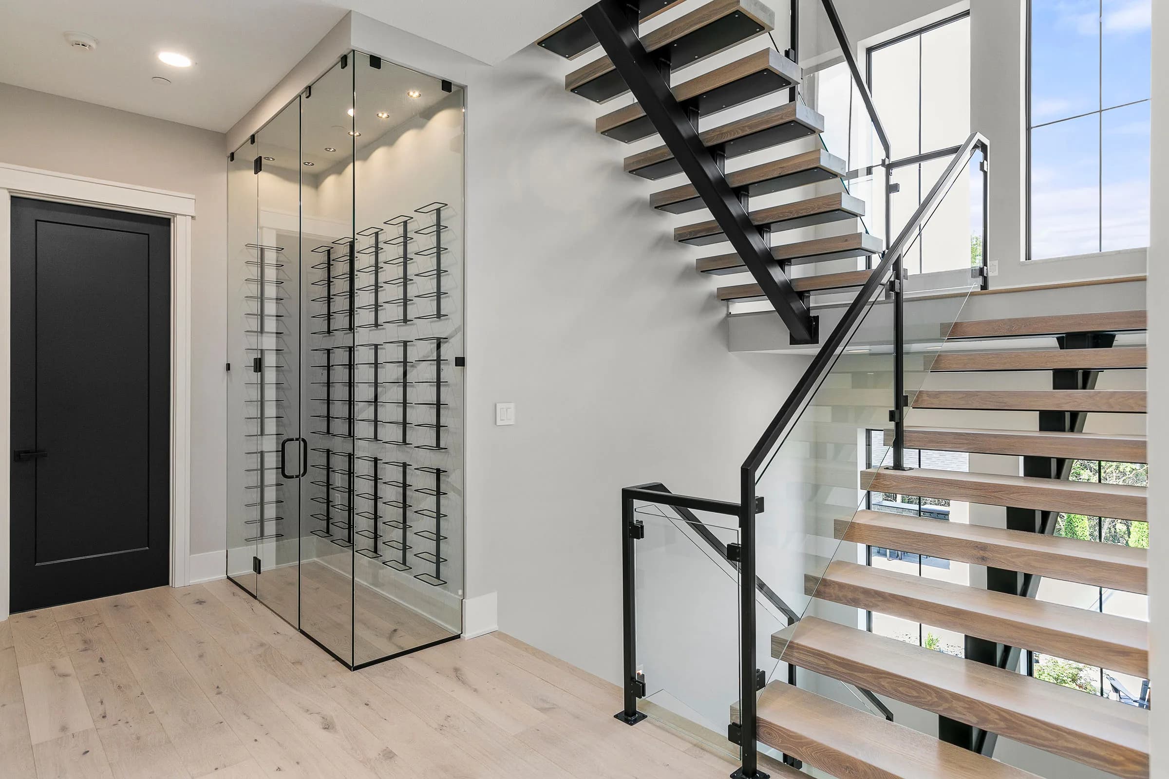 Forest Pointe — floating staircase with glass rail