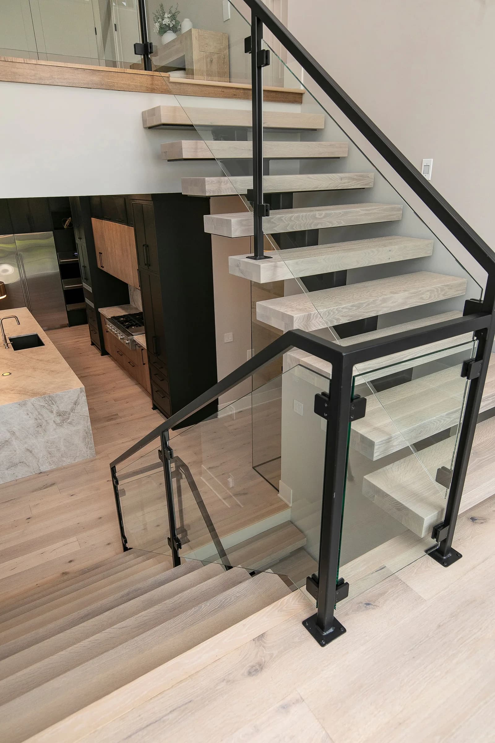 Forest Pointe — stair landing overlooking the bar