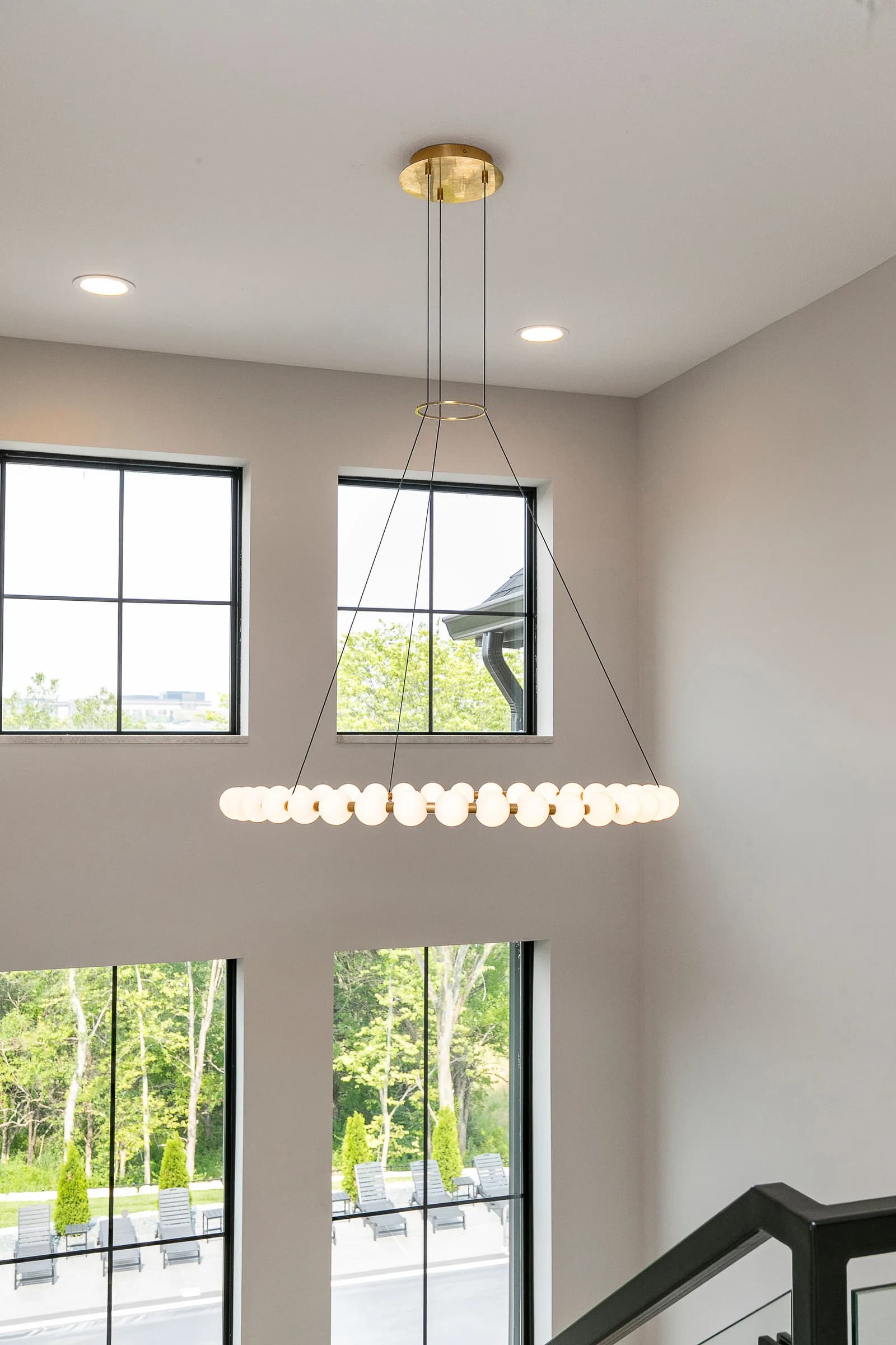 Forest Pointe — two-story window wall and stair