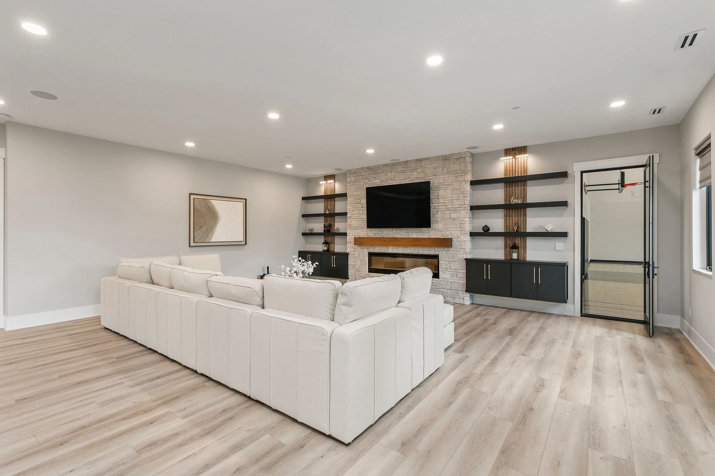 Forest Pointe — lower-level family room with built-ins