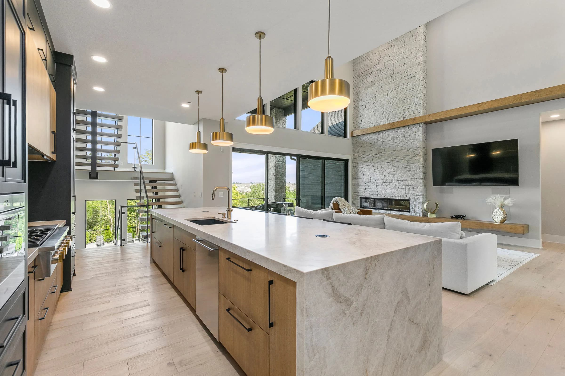 Forest Pointe — double islands toward the floating stair