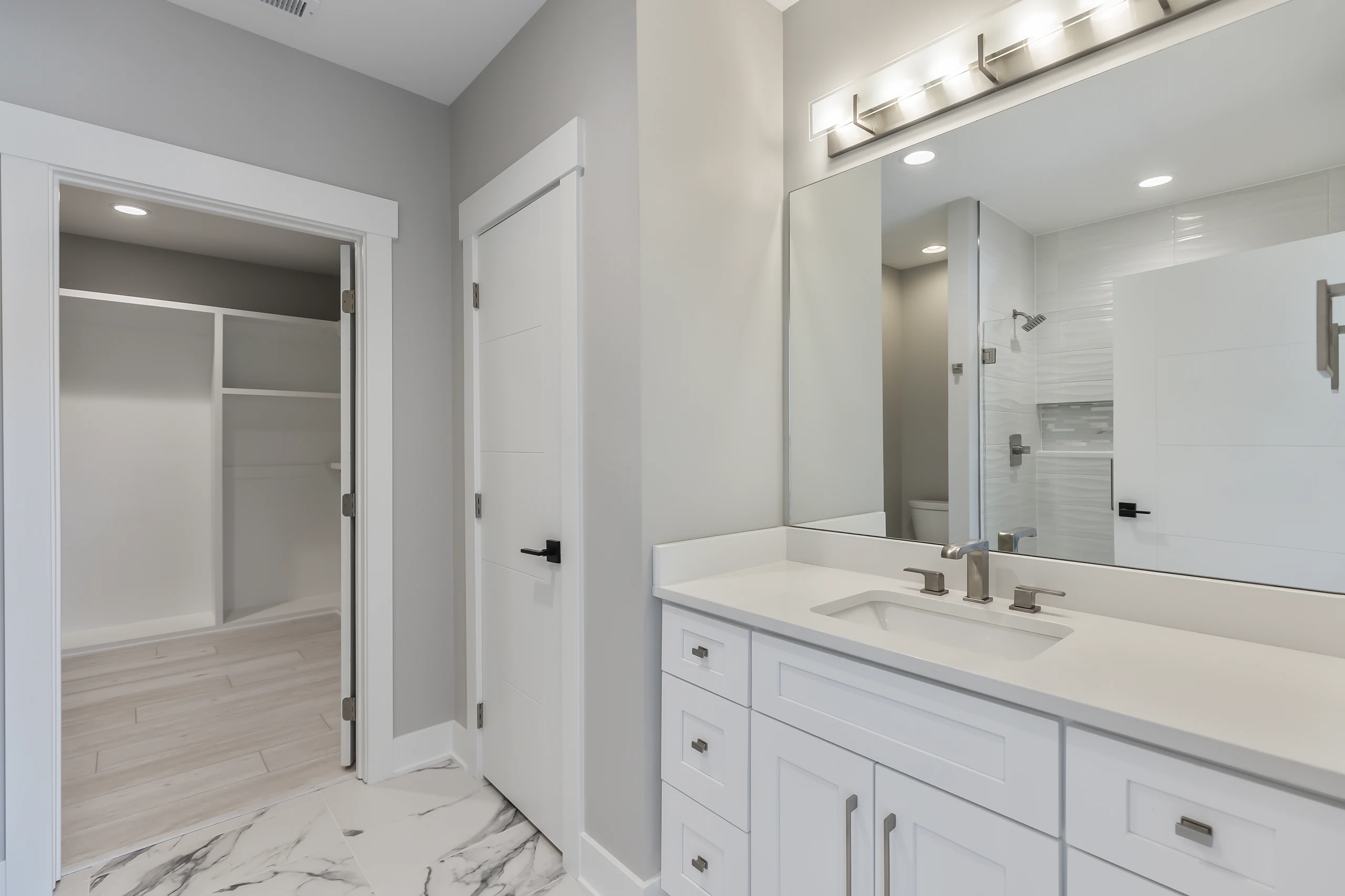 Spa-grade primary bath — MIR Homes